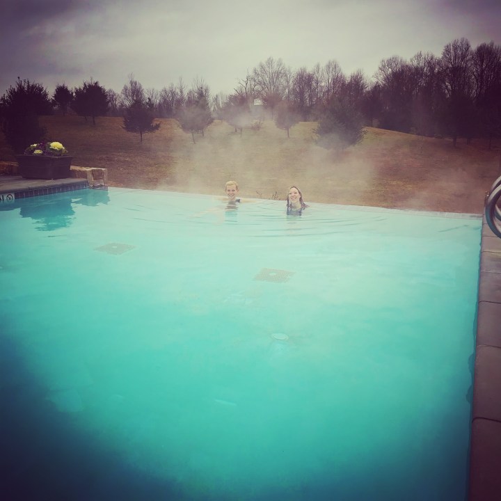 girls in a heated pool